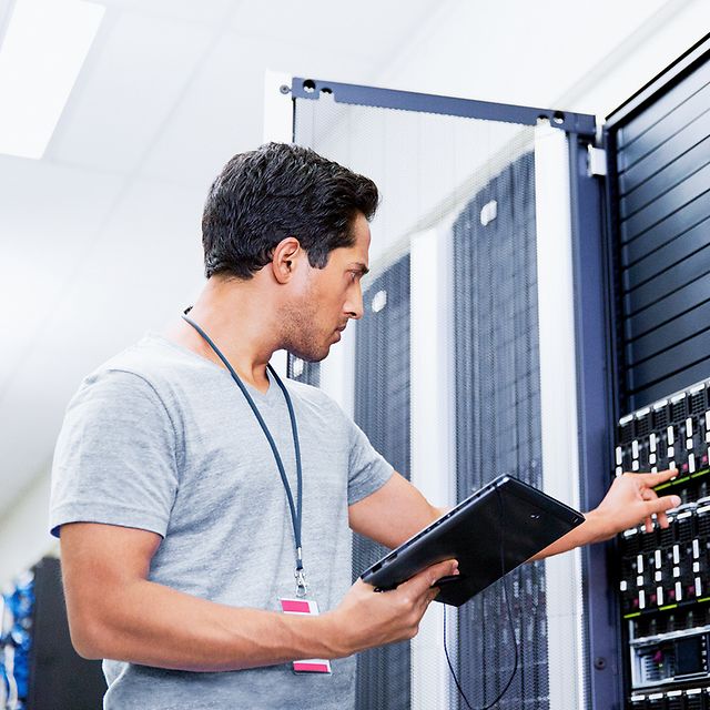 An employee is making settings on a server.