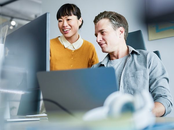 Two people chatting on the computer