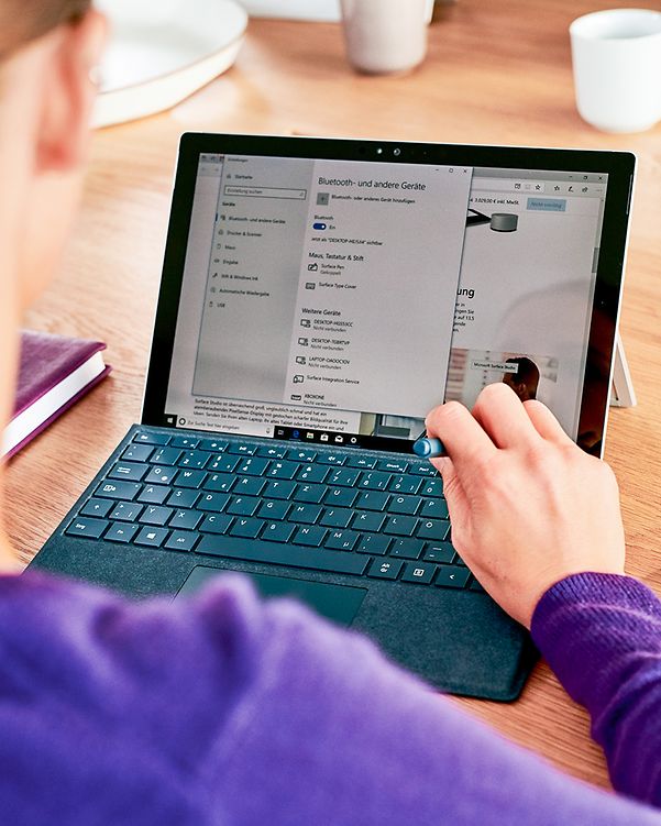 Woman on laptop uses ConnectWise Cloud Backup to restore her data