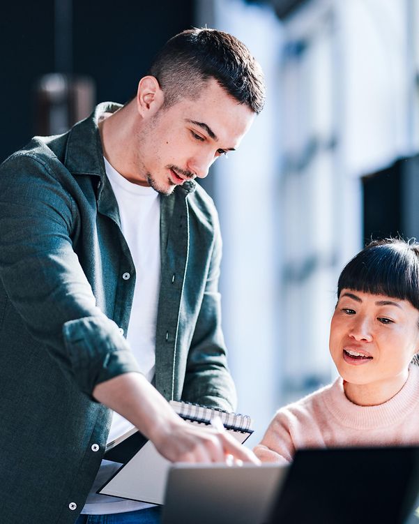 Young professionals work together in modern co-working spaces