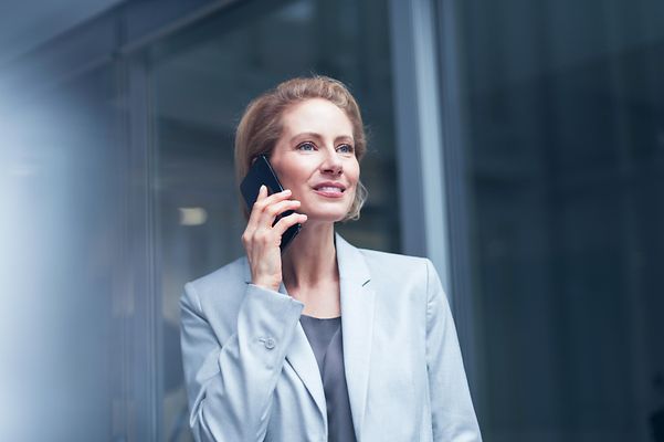 A young woman is on the phone.