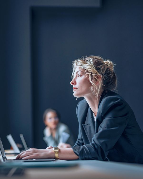 Businesswoman working on a laptop computer in the office