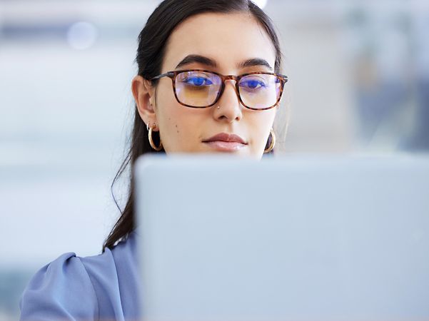 Woman sitting at her laptop