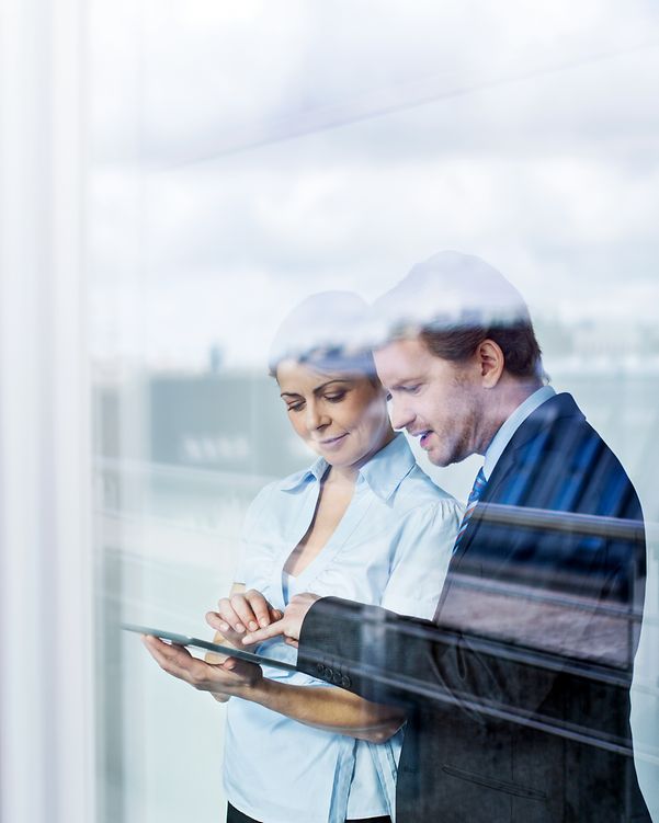 Business people in the office with digital tablet