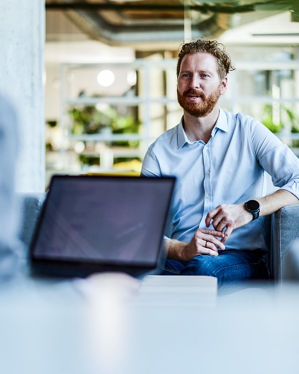 Businessman talking to a customer in the office