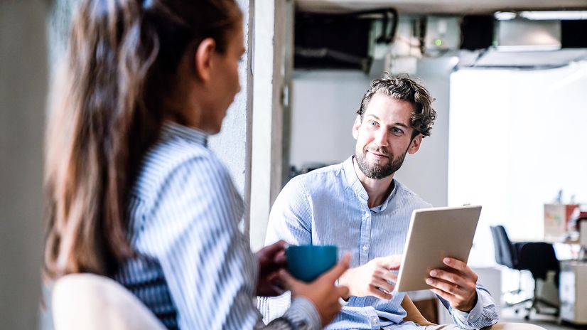 Portrait of business colleagues working together in the office.