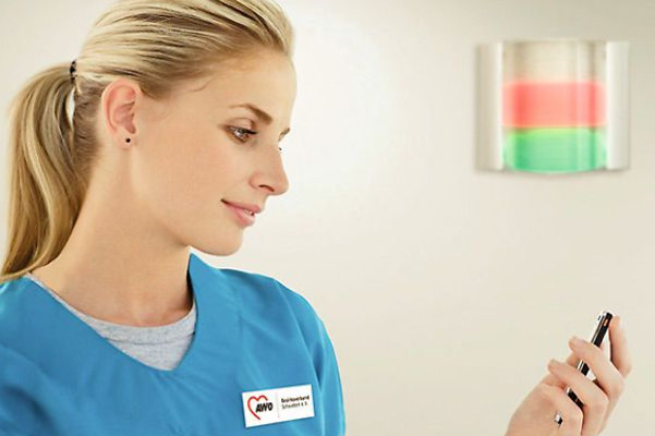 Caregiver registers a light call on her smartphone