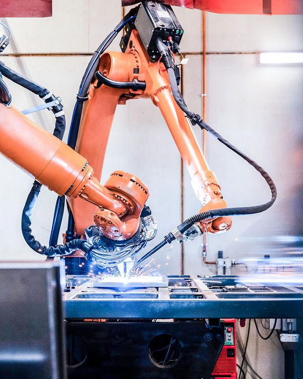 A robotic arm is controlled by artificial intelligence.