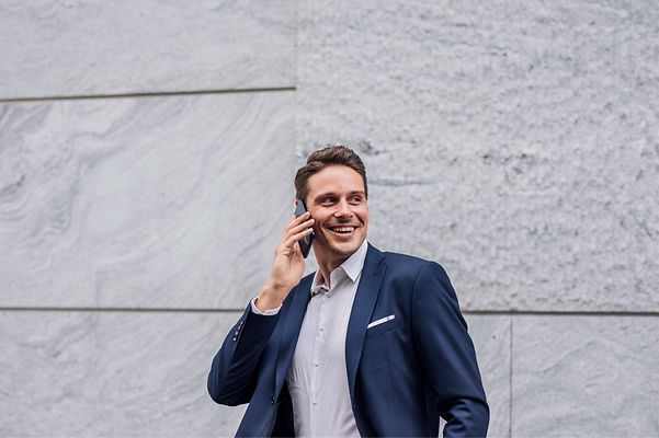 Man talking on mobile phone.