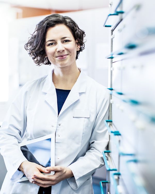 Doctor standing in her practice with a Samsung A series device