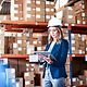 A woman searches the warehouse for the right goods for her online sales generated via marketplaces and comparison portals.