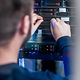 An IT specialist expands the web space with additional storage space.