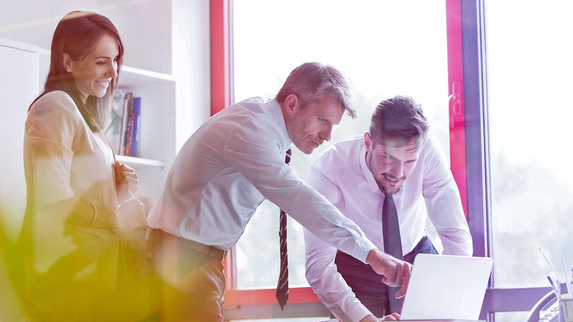 Three business partners discuss the three stages of business partnership.