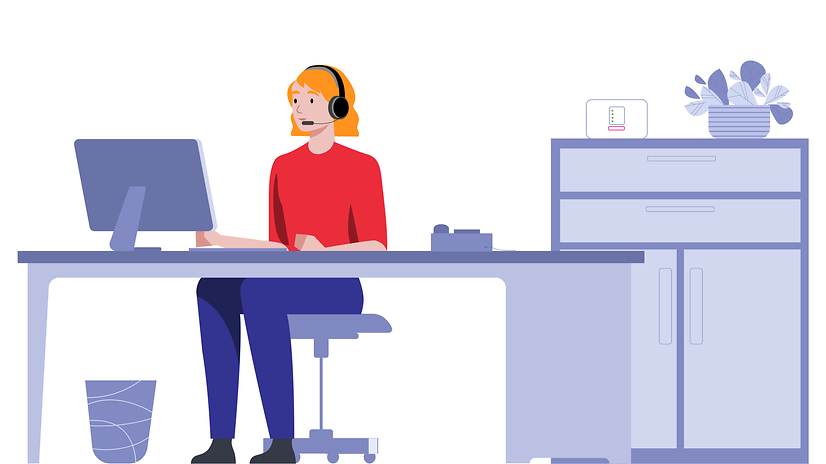 Woman sitting at office desk wearing headset, with router on chest of drawers