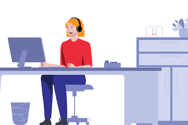 Woman sitting at office desk wearing headset, with router on chest of drawers