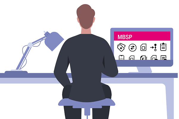 A man sits at his desk and looks up information on the Magenta Business Service Portal (MBSP).