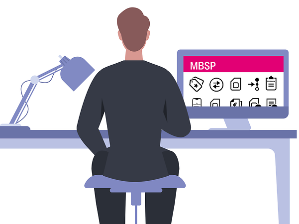 A man sits at his desk and looks up information on the Magenta Business Service Portal (MBSP).