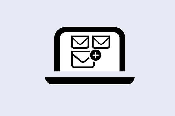 Laptop with emails and a plus sign