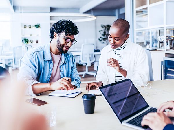 Two businessmen discussing matters in a joint meeting