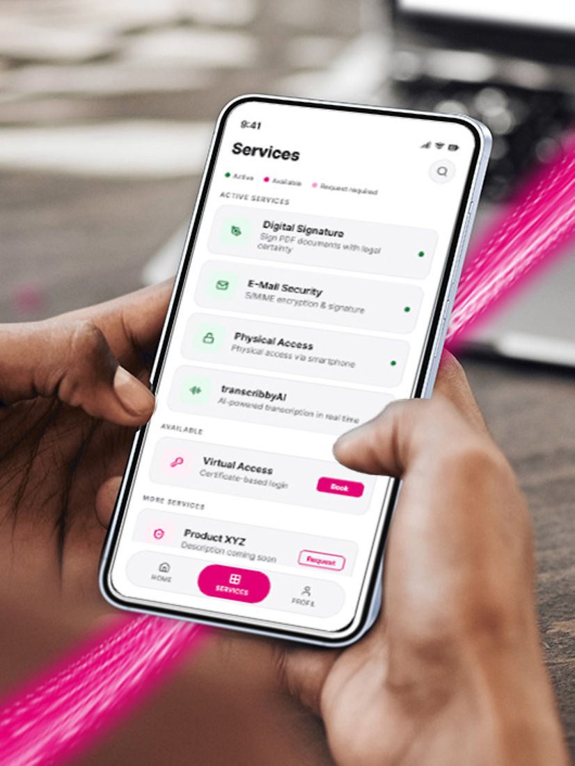 Two hands are holding a mobile phone with a magenta-and-black security app for identification displayed on the screen